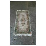 Small wool hallway runner measures 50 inches