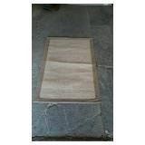 Small brown hallway runner, measures 48 inches