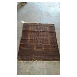 Early wool rug, does show age ware, measures 52