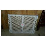 Poly folding safety gate has some wear but still