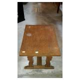 End table with oak finish, top shows wear and has