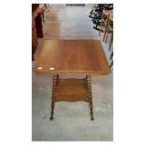 Lamp table with secondary shelf and turned legs,
