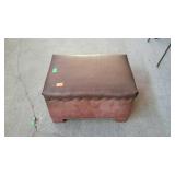 Vinyl covered small ottoman. 14"×19"×11".