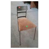 Unusual metal framed chair. Looks like an art