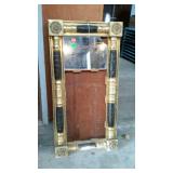 Early wall mirror frame, black and gold tone