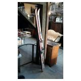 Two sets of skies only no boots or poles