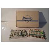 Two plaster wall plaques by Michael