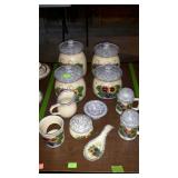Pottery - 4-pc canister set, shakers, creamer,