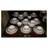 33-pcs Limoges china with double handled cups,