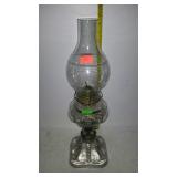 Oil lamp with chimney globe