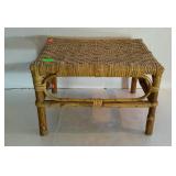 Rattan framed and wicker footstool, 15 x 12 x 10"