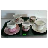 Collection of 6 mustache cups 4 with saucers