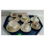 Group of 6 painted china tea cups and saucers