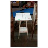 White painted accent stand, spool design legs