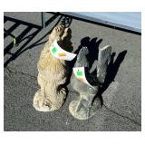 Two concrete roaster garden decor figures, both
