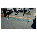 2 metal folding bed frames, and a kerosene heater