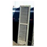 Pair of wooden louvered shudders, 15 x 63" show