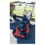 Aries self propelled mower with rear bagger