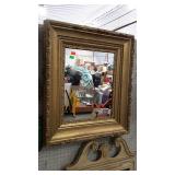 Wall mirror, ornatly quadruple gold gilt framed -