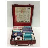 Older metal first aid kit, Marked E72 with first