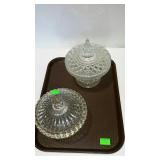 Two covered candy dishes