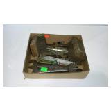 Flat with wrenches and two wire brushes