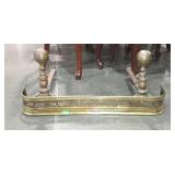 Brass fireplace fender and pair of andirons