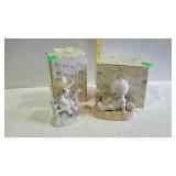 Two Precious Moments figurines with boxes