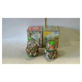 Two musical Easter snow globes with boxes - one