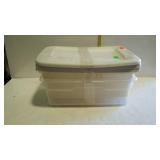 Three small storage totes with lids