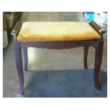 Vanity bench with gold upholstered padded seat -