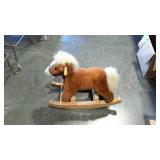 Cute little toddler sized, singing rocking horse.