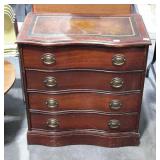 Mahogany four drawer chest. Serpentine front,