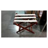 Folding suitcase stand.