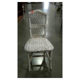 Single white wicker side chair. Seat height 17".