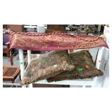 Two throw pillows and valance with rod.