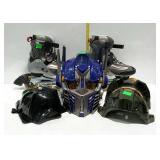 Roller blades and three action figure masks.