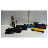 Tray of Lionel trains and accessories.