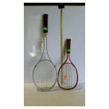 One tennis racket and on handball racket.