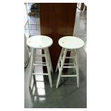 Two white painted stools, measure 30 inches tall