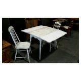 White painted drop leaf table with two chairs,