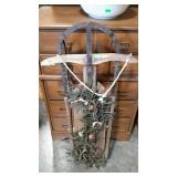 Runner sled with Christmas decor on it