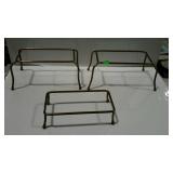 Three brass stands
