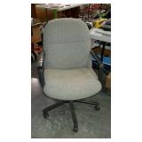 Wheeled office chair. Upholstered.