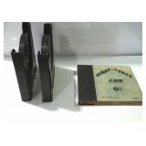 Three sleeves/books of 78 RPM Records.