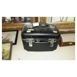 American Tourister cosmetic case with luggage tag,