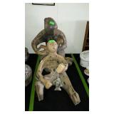 Two decor statues, both have damage Aztec theme