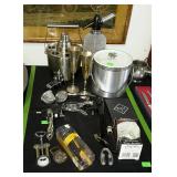 Cork screws, ice bucket, mixer and shot glasses,
