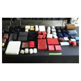 Table lot of jewelry containers for rings,