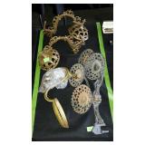 Wall mounts for oil lamps and some brackets.